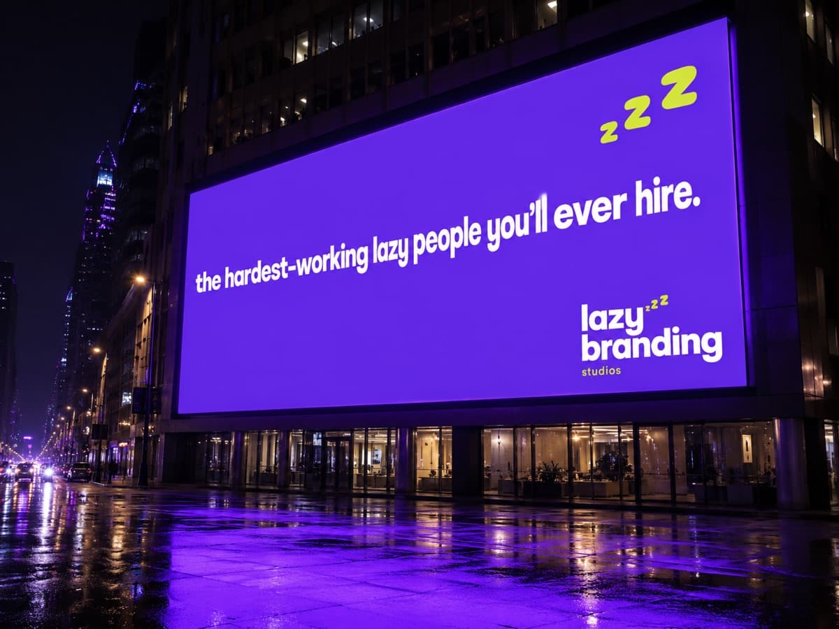 lazybranding billboard at night, one line of lowercase type on purple